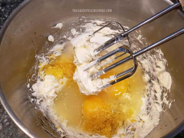 A lemon and cream cheese filling is mixed together for the tart.