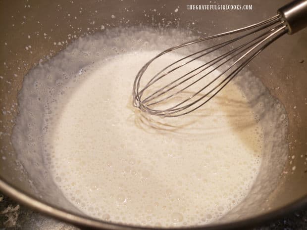 Whipping cream, powdered sugar and vanilla are beaten until soft peaks form.