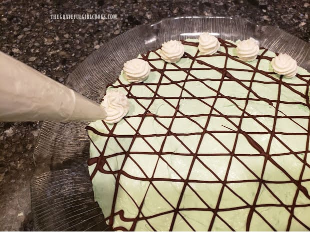 Making stabilized whipped cream lets you pipe it onto desserts and it will hold it's shape.