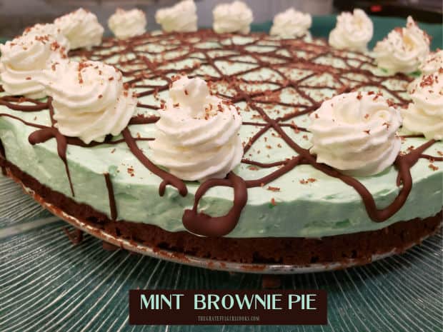 Mint Brownie Pie is a perfect St. Patrick's Day (or any other day) dessert! Mint cream cheese filling tops a brownie base. Easy and yummy! 