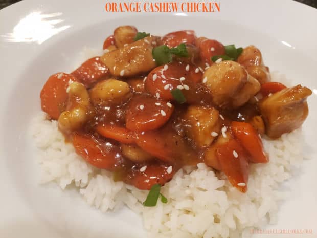 Orange Cashew Chicken is a yummy twist on a Chinese classic! Chicken, veggies and cashews are cooked in a thick, Asian-inspired orange sauce.
