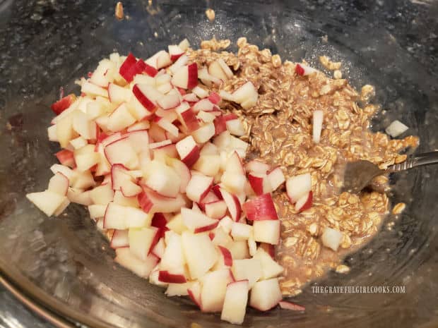 Diced apples are added to the batter for the apple cinnamon baked oatmeal bites.