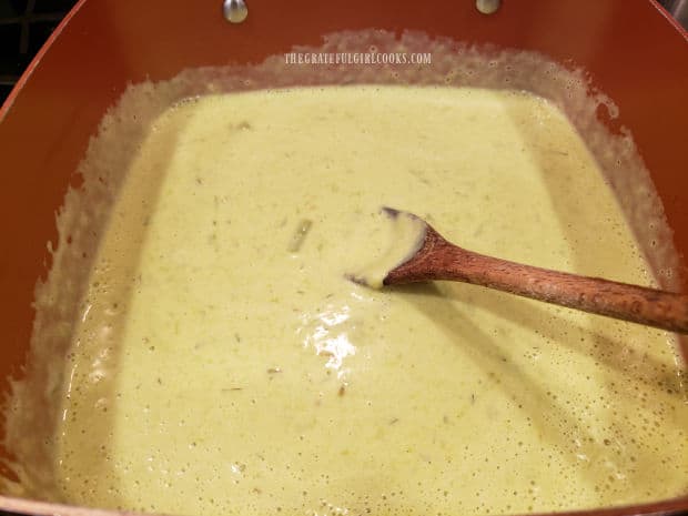After stirring, the cream of asparagus soup is thick and creamy.