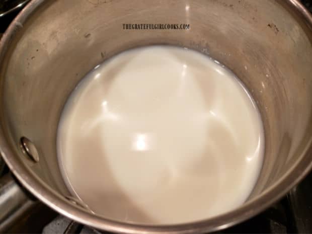 Milk, cornstarch and salt are cooked in saucepan until thickened.