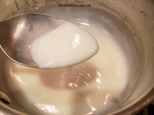 Thickened milk, cornstarch and salt mixture is set aside to cool after it is cooked.