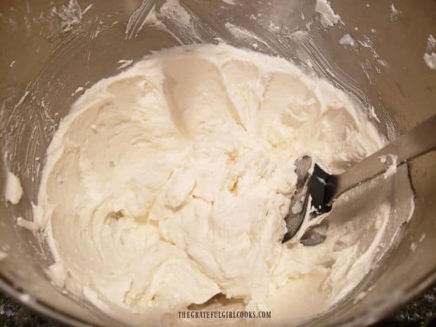 The frosting for Grandma's red velvet cake is mixed for at least 15 minutes, until very fluffy.