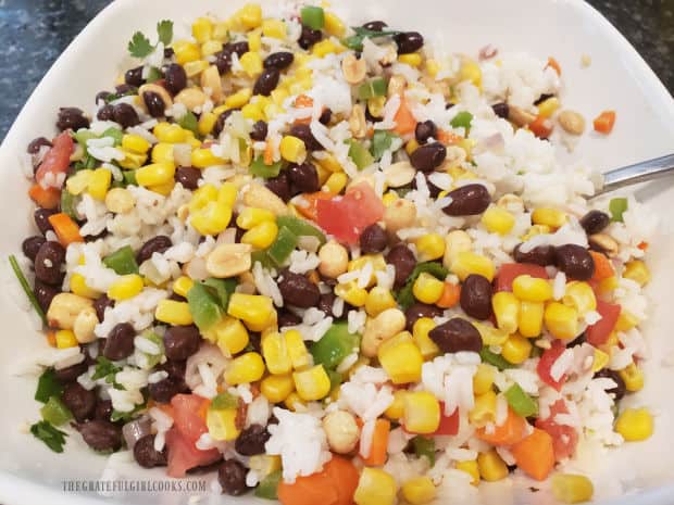 Southwestern Rice Salad is very colorful after adding all the ingredients.