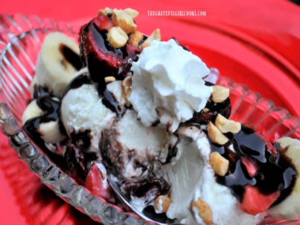 Homemade vanilla ice cream is used to make a banana split.