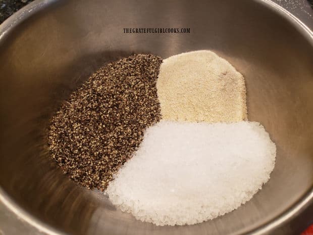 Spice rub for the beef brisket is combined in a bowl, and is ready for garlic paste to be added.