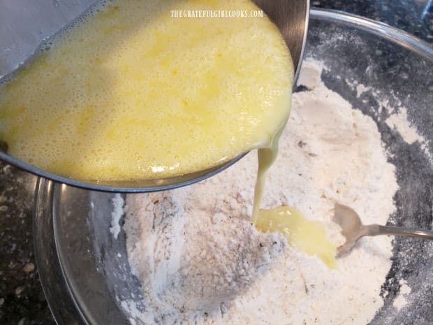 Egg, oil and milk mixture is added to the dry ingredients to make the bread batter.