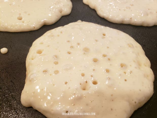 Time to turn over the pancakes when large bubbles appear on the top.