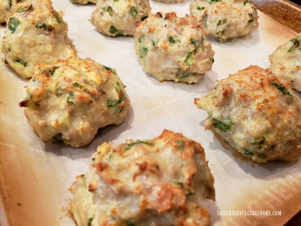 Once baked, the Italian Chicken Parmesan Meatballs will be golden brown on top.