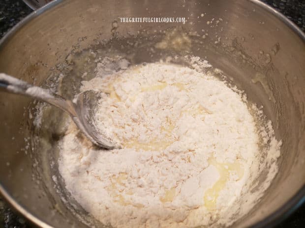 Lemon juice, vanilla and lemon zest are added to and stirred into the batter until fully combined.