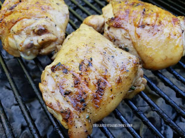 Chicken cooking on the BBQ after soaking in the smoky grilled chicken marinade for hours.