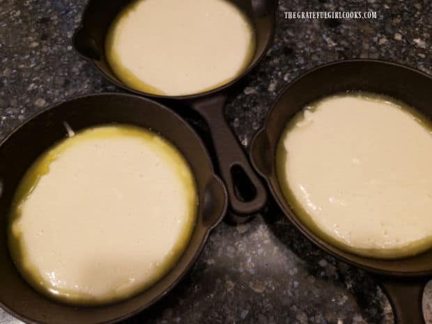 Batter is poured onto the top of melted butter, but is not stirred in.