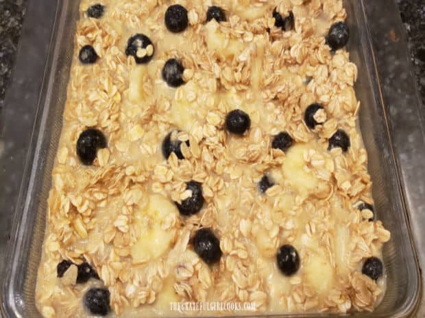 A baking dish full of the oatmeal mixture, ready to go into the oven.