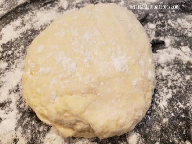 After kneading, the dough for the buttermilk cornmeal biscuits is ready for the next step.