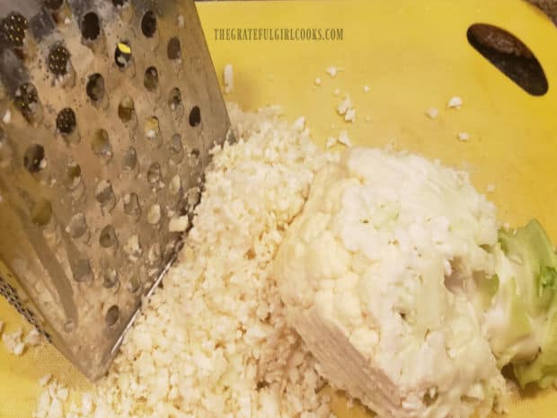 Shredded cauliflower is ready to add to the soup pot.