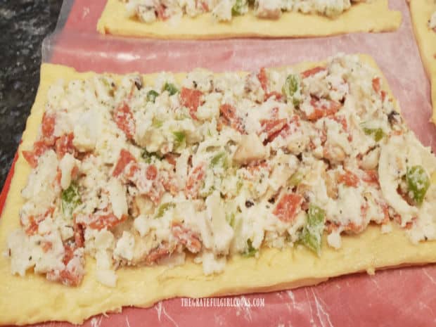 Filling is spread out to within 1/4" of the edges of the dough.