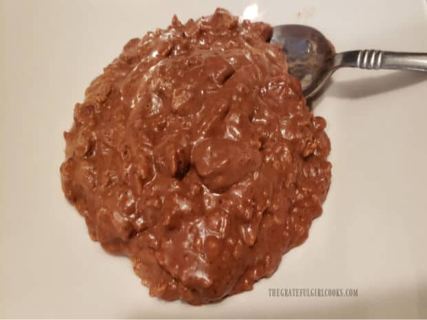 The chocolate oatmeal is transferred to a serving bowl, to garnish before serving.