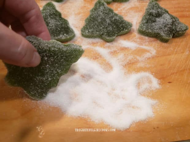 Edges of the Christmas tree gumdrops are rolled in sugar to lightly cover.