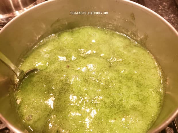 The lime flavored gelatin mixture is boiled for one minute before removing it from the heat..