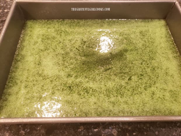 Hot lime gelatin is poured into prepared baking pan, then refrigerated until set.