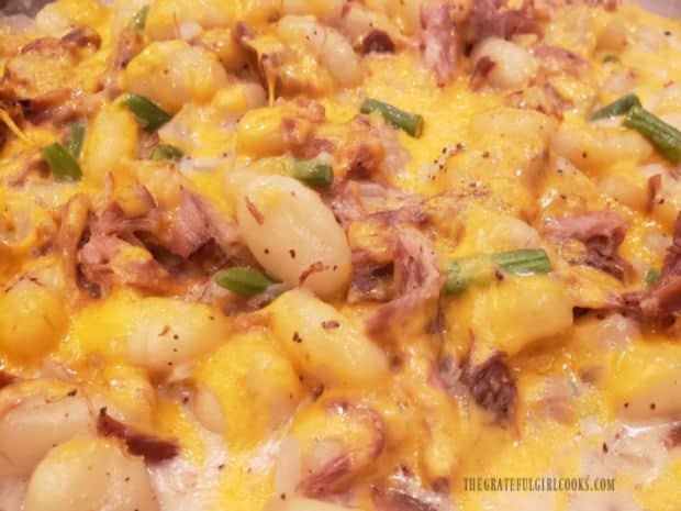 A close up photo of the ham and cheddar gnocchi, ready for serving.