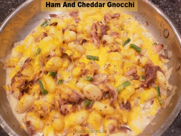 Ham and Cheddar Gnocchi is a delicious, creamy, easy, one skillet meal, with ham, potato gnocchi, green beans, cheese, onions and garlic!