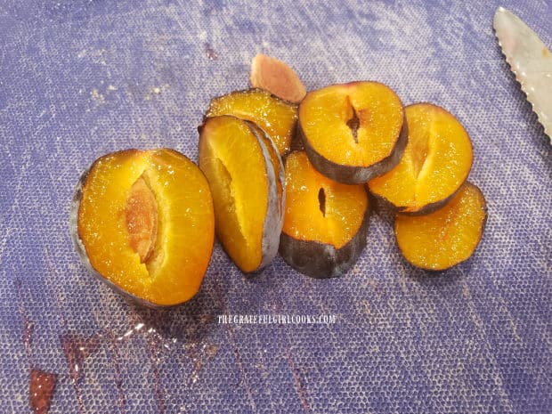 Italian plums are a golden color inside, once sliced and seed has been removed.