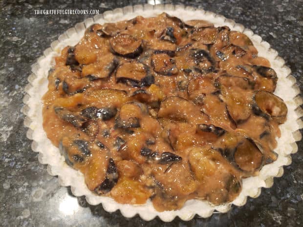 Fruit filling has been added and the Italian Plum Shortbread Tart is ready to top with streusel.