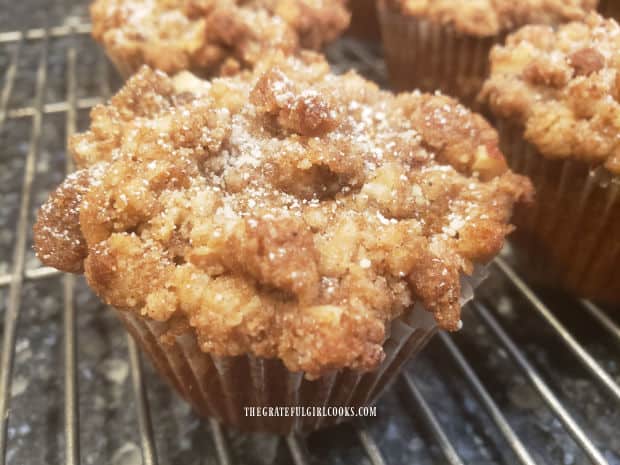 A close up of one of the pumpkin pecan streusel muffins.
