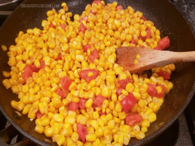Southwestern skillet corn is cooked until heated through in the pan.