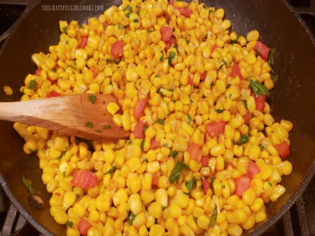 The Southwestern skillet corn is cooked for 3-4 minutes, then served.