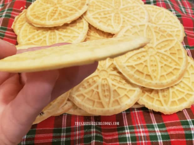 A side view of how thin the classic pizzelle cookies are.