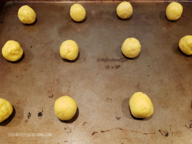 Cookie dough is shaped into 1" balls and placed on baking sheet.