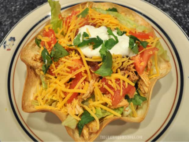 Mexican Shredded Chicken is featured in a Taco Salad Bowl.
