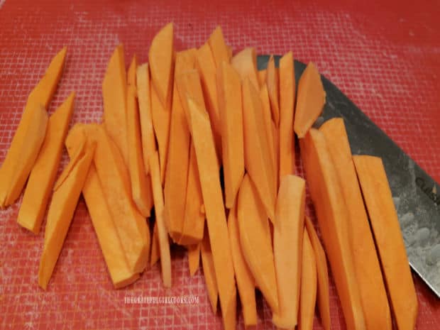 The sweet potatoes are cut into french fry-sized pieces.