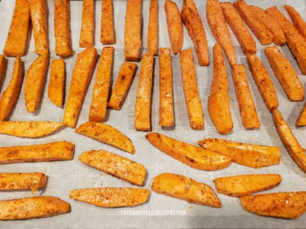 Fries are cooked on a single layer on parchment paper-lined baking sheet.