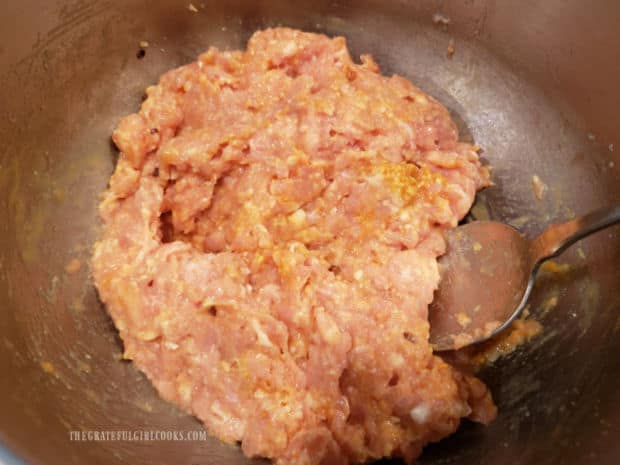 The meat mixture for Firecracker Chicken Meatballs is ready to shape and cook.
