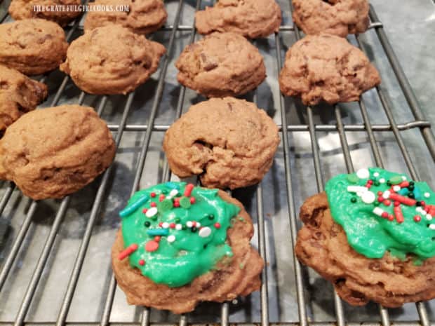 Colorful sprinkles are added to the top of the frosted chocolate mint cookie bites.