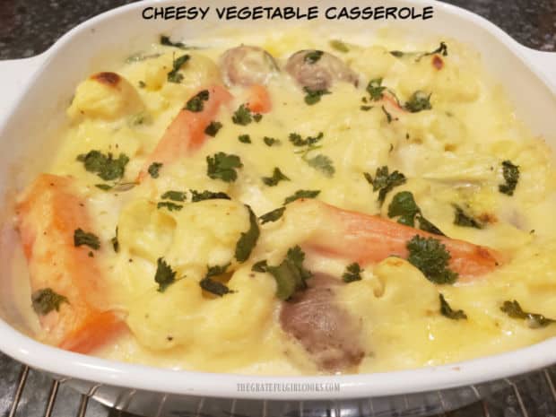 Cheesy Vegetable Casserole is an easy side dish to make, with red potatoes, cauliflower, asparagus and carrots baked in a yummy cheese sauce.