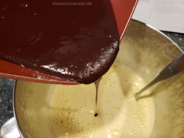 Chocolate mixture is added slowly to egg mixture and then stirred to combine.
