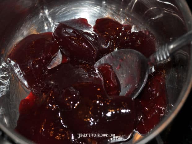 Seedless raspberry jam is heated, stirring until mixture becomes a smooth glaze.