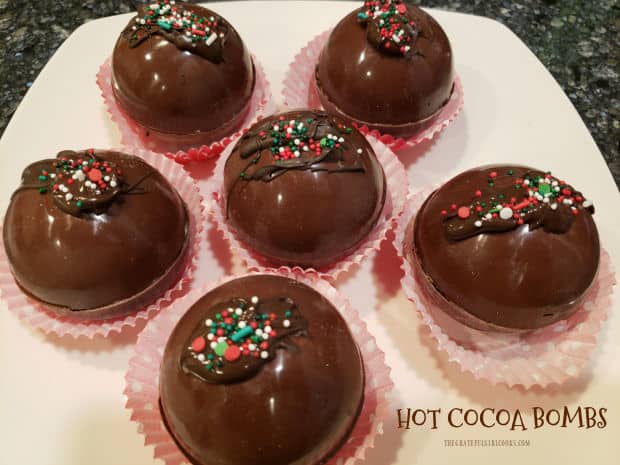 Hot Cocoa Bombs are a yummy, fun way to enjoy hot chocolate! Hot cocoa mix and mini marshmallows appear when hot milk or water is added!