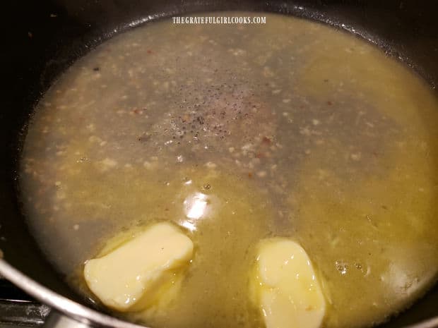 Butter is added and melted into liquids remaining in skillet after removing mussels.