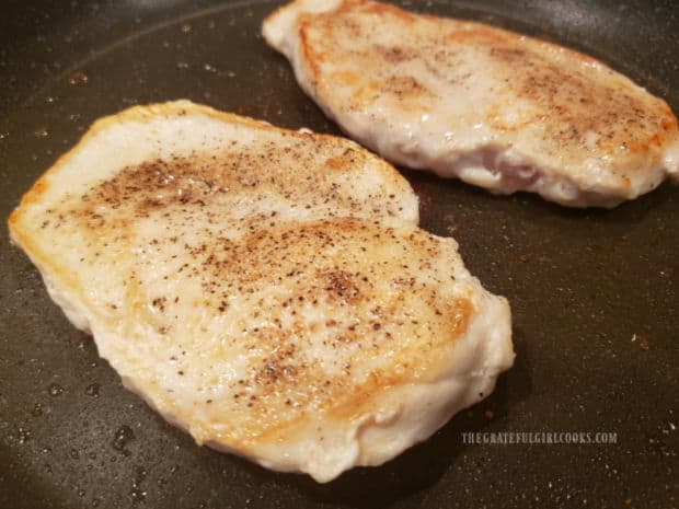 Flipping the chicken half way through cooking ensures golden brown color on both sides.