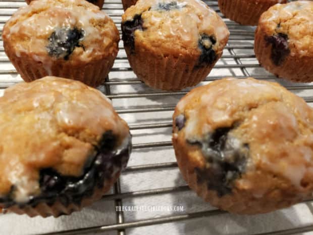 Glazed blueberry oat muffins, on a wire rack and ready to eat!