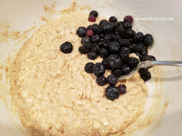 Blueberries are gently folded into the batter for the blueberry oat muffins.