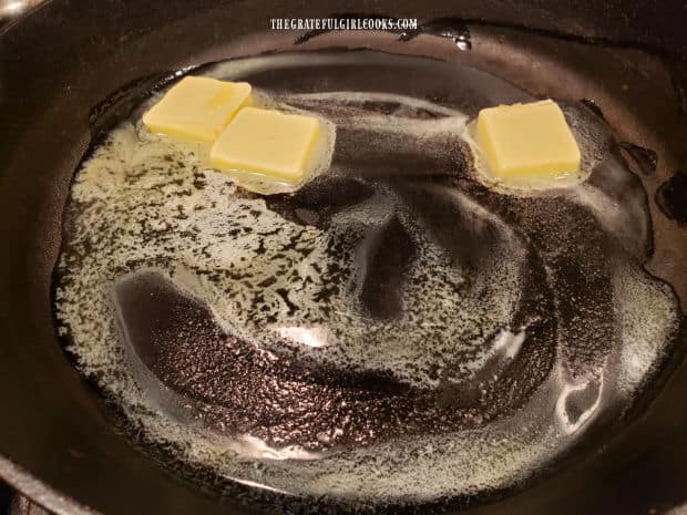 Butter is first melted in a cast iron skillet, to begin making sauce for shrimp.